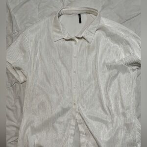 Plus sized light cream coloured  crinkle textured short sleeved beach shirt